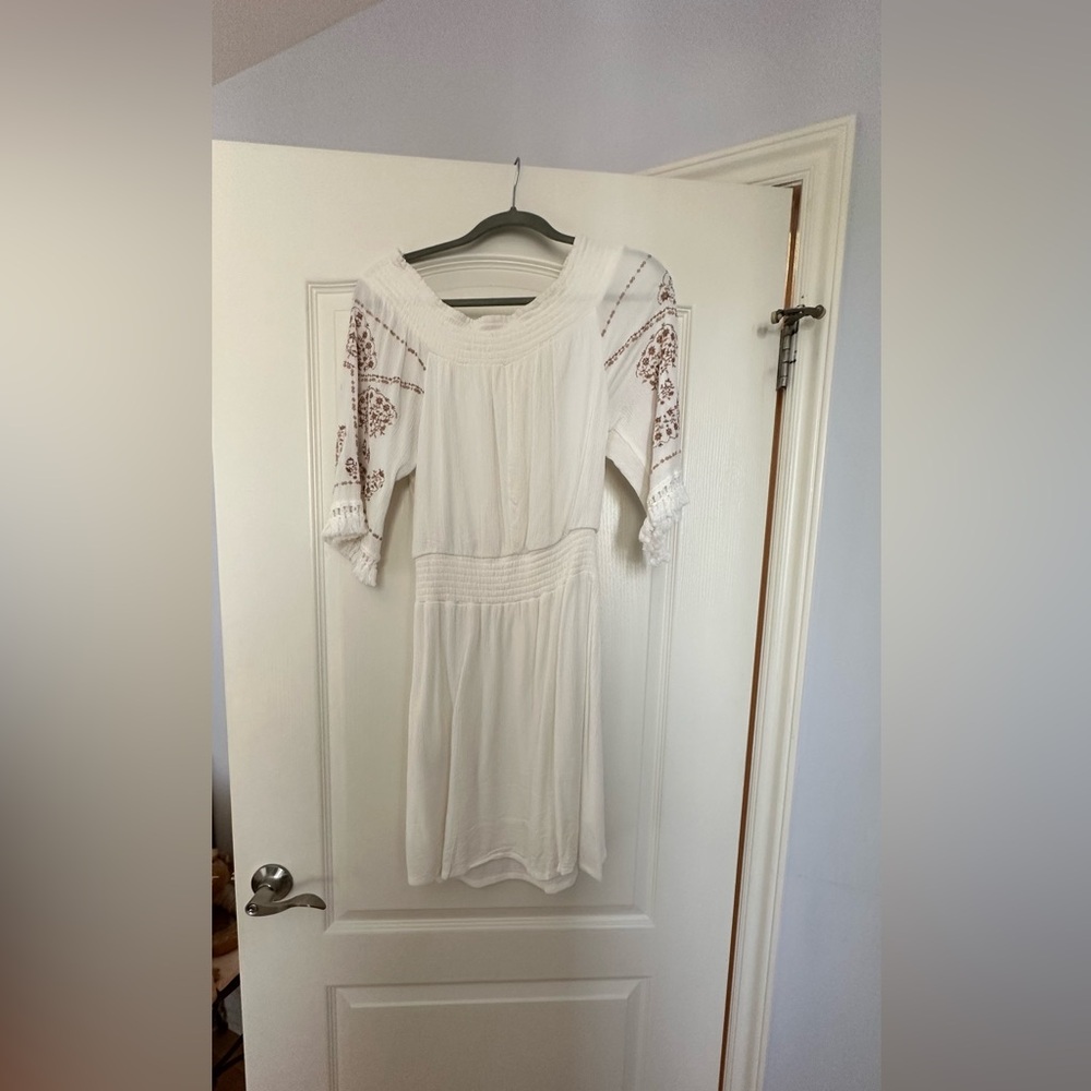 White dress with embroidered sleeves